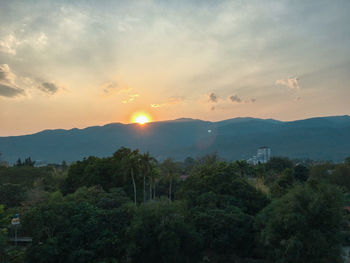 Scenic view of mountains against sky during sunset