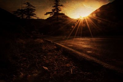 Scenic view of silhouette landscape against sky during sunset