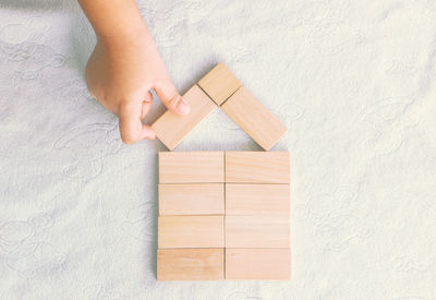 High angle view of child playing with toy