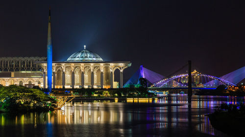 Illuminated cityscape at night