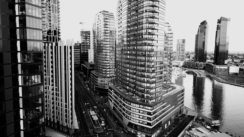 Panoramic view of buildings and city against sky