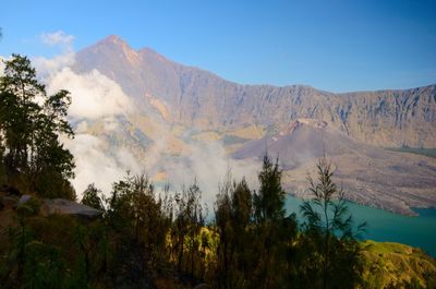 Panoramic view of volcanic mountains against sky