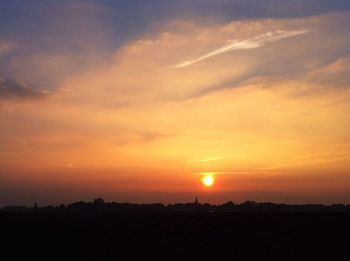 Scenic view of landscape at sunset