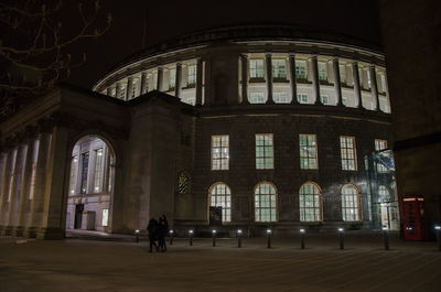 Illuminated building at night