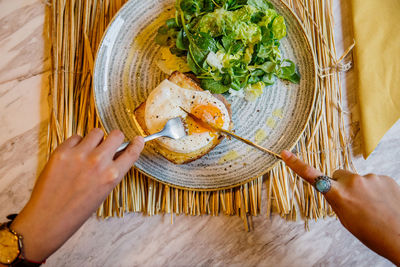 High angle view of woman preparing food