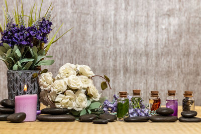 Close-up of various flowers on table