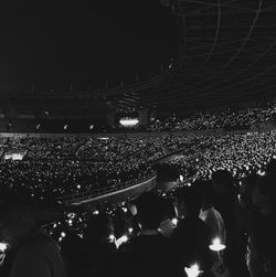 Crowd at music concert at night