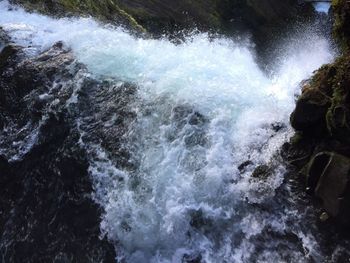 Waves splashing on rocks