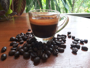 Close-up of coffee beans on table