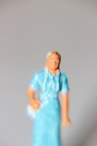 Boy standing against white background