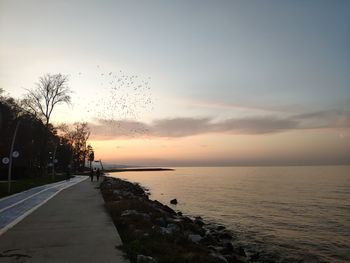 Scenic view of sea against sky during sunset