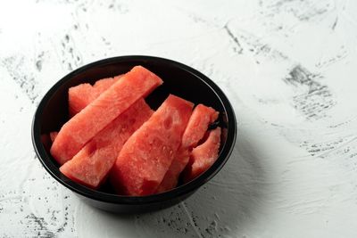 High angle view of fruits in bowl on table