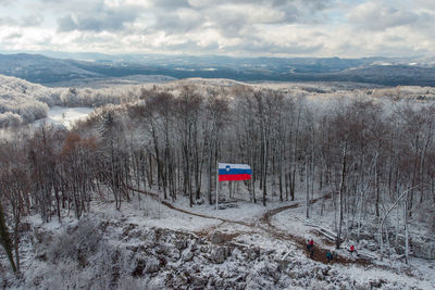 Scenic view of snow covered mountains against sky