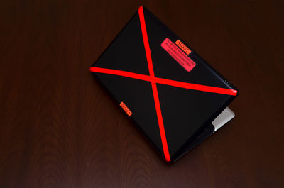 Close-up of red object over black background