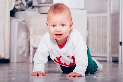 Portrait of cute baby crawling