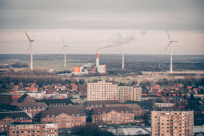 Aerial view of townscape against sky