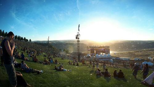 People on grassy field