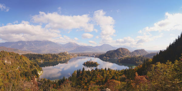 Scenic view of lake against cloudy sky