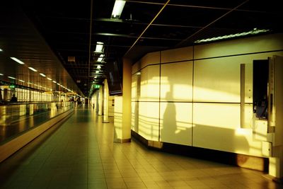 Illuminated railroad station platform