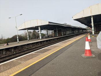 Railroad station platform against sky