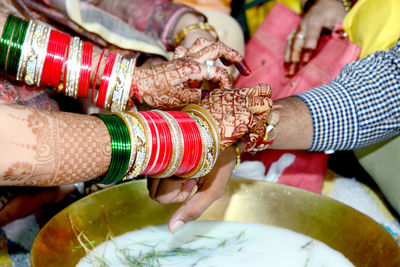 Midsection of woman with hands