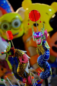 Close-up of toys for sale in market