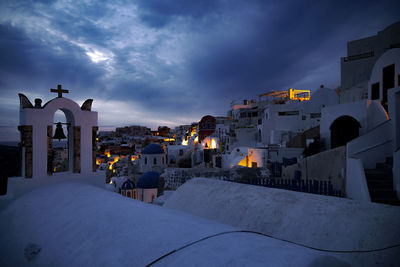 Houses in city at night