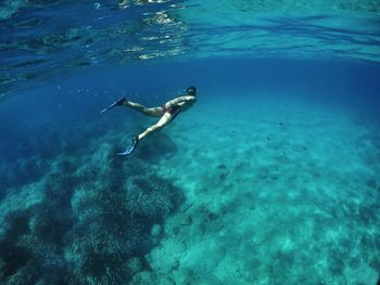 Man swimming in sea