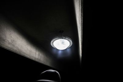 Low angle view of electric lamp on ceiling