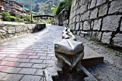 Stone wall against brick wall