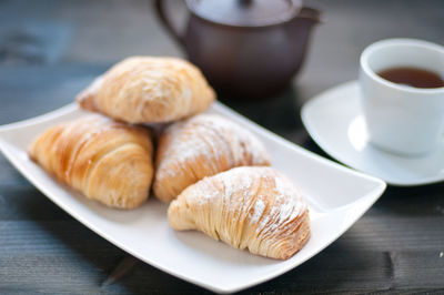 Close-up of breakfast served on table