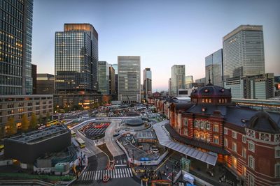 High angle view of city lit up at night
