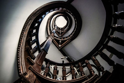 Directly below shot of spiral staircases in building