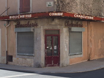 Closed door and windows of abandoned store