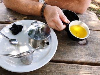 Man drinking tea at the table