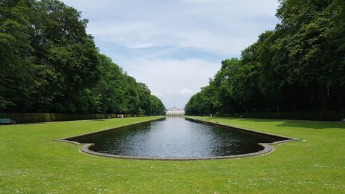 Fountain in park against sky