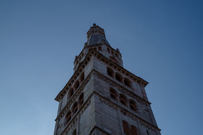 Low angle view of building against blue sky