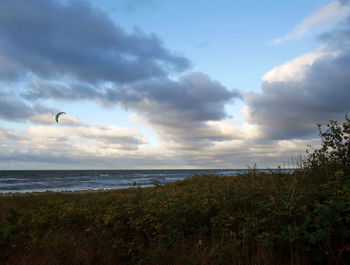Scenic view of seascape against cloudy sky