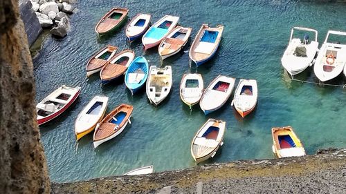 High angle view of boats moored on shore