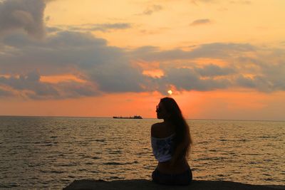 Scenic view of sea at sunset