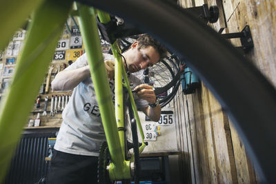 Mechanic working on bicycle