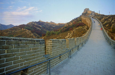 Built structure on mountain against sky