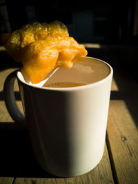 Close-up of coffee cup on table