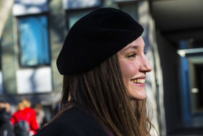 Portrait of young woman looking away