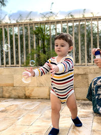 Full length of a boy playing