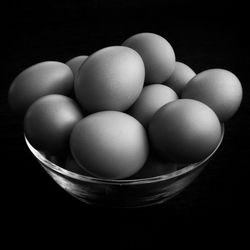 High angle view of eggs against black background
