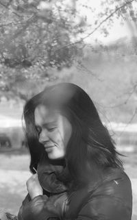 Close-up of young woman in forest