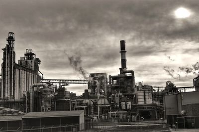 Low angle view of factory against the sky