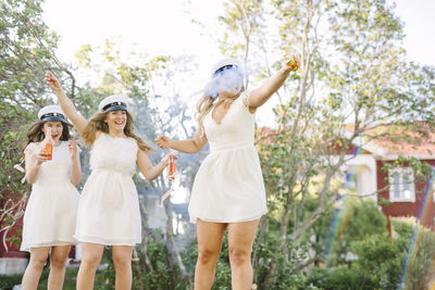 Women celebrating graduation