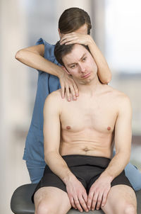 Young couple sitting